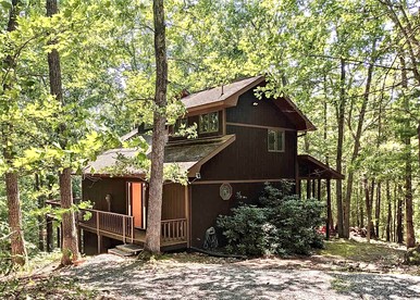 Peaceful Rustic Hideaway with Hot Tub, Fire Pit & Scenic Views in Berkeley Springs, West Virginia - glamping.directory
