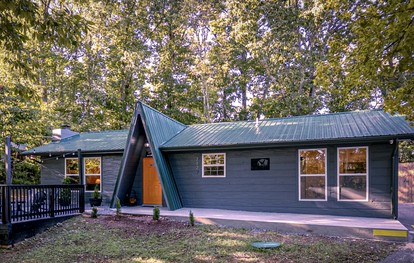 Cozy Mountain Cabin Retreat with Hot Tub, Fire Pit, and Game Room for Relaxing Getaways in Sevierville, Tennessee - glamping.directory