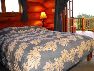 Unique Getaway at Rustic Log Cabin Bed and Breakfast in Hawaiian Acres, Hawaii - Keaau, Hawaii - glamping.directory