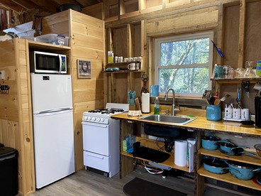 Romantic Cabin Rental Overlooking Otter Creek in the Adirondacks of Upstate New York - Brantingham, New York - glamping.directory