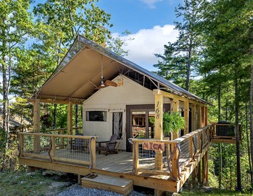Secluded Tree Tent with Outdoor Soaking Tub & Pizza Oven Near Blue Ridge Waterfalls, Zirconia, North Carolina - glamping.directory