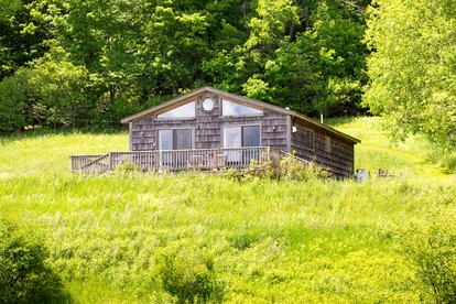 Peaceful Cabin Retreat with Mountain Views & Private Acreage in Hamden, New York - glamping.directory