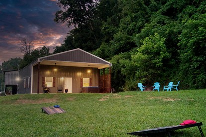Barn Living with a Twist: Hot Tub Relaxation and Pigeon Forge Excitement Await! - glamping.directory