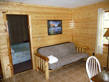 Rustic One-Bedroom Cottages with Free Boat Rentals near Saratoga Springs, New York - Lake Luzerne, New York - glamping.directory