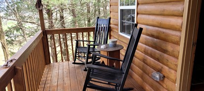 Rustic Elegance: Vintage Decor Cabin with Mountain Scenery in Sparta - Sparta, Tennessee - glamping.directory