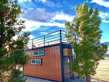 Shipping Container Home with Cowboy Pool in Joshua Tree, CA - glamping.directory