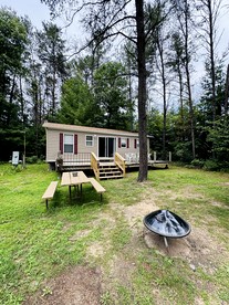 Group Cabin with Large Deck and Patio in Wisconsin Dells - Wisconsin Dells, Wisconsin - glamping.directory