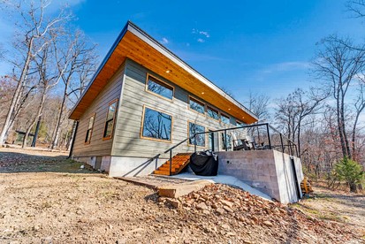Secluded Riverfront Cabin with Scenic Bluffs near Fayetteville, Arkansas - Fayetteville, Arkansas - glamping.directory
