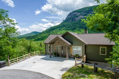 Mountain Hideaway with Waterfall Views & Relaxing Hammocks in Chimney Rock, North Carolina - glamping.directory