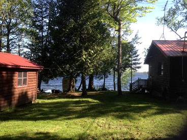 Charming Lakefront Cabin Rental with a Fire Pit near Brownville, Maine - glamping.directory