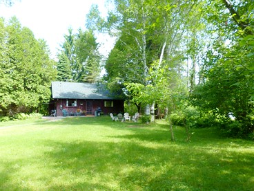 Rustic Cabin Rental on a Wildlife Sanctuary in Manistee, Michigan - glamping.directory