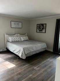 Spacious Cozy Cottage with Foosball Table, Private Deck and Fire Pit in Indian Trail, North Carolina - Indian Trail, North Carolina - glamping.directory