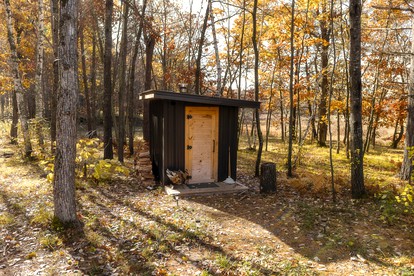 Cabin Charm by the Pine: Pet-Friendly Retreat in Mission Township's Riverside Haven - glamping.directory