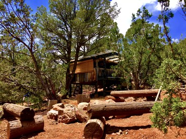 Rustic Tree House Rental with a Fire Pit in Bernalillo County, New Mexico - glamping.directory