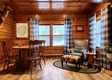 Charming Log Cabin with Hot Tub and Fireplace Minutes from Gore Ski Resort in New York - North Creek, New York - glamping.directory