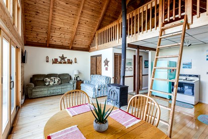 Mountainside Cabin with Hot Tub, Fire Pit and Deck Tucked Away in the Woods of Great Cacapon, WV - Great Cacapon, West Virginia - glamping.directory