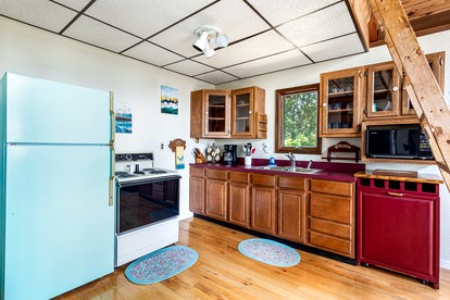 Mountainside Cabin with Hot Tub, Fire Pit and Deck Tucked Away in the Woods of Great Cacapon, WV - Great Cacapon, West Virginia - glamping.directory