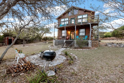 Gorgeous Rustic Log Cabin with Fire Pit and Grill near Top Wineries in Fredericksburg, Texas - glamping.directory