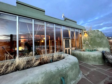 Secluded Sustainable Earthship Retreat with Off-Grid Living Near Tres Piedras, New Mexico - glamping.directory