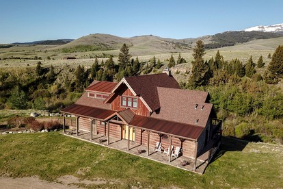 Scenic Mountain Cabin with Creekside Deck & Outdoor Fireplace near North Meadow Creek, Montana - glamping.directory