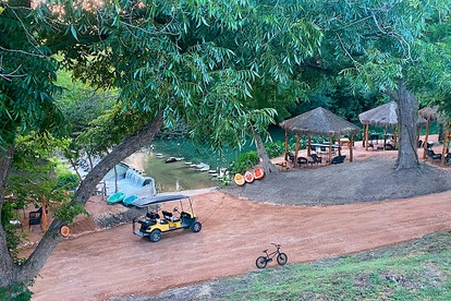 Deluxe Safari Tent Cabin with Creek Swimming, Fishing & Resort-Style Amenities in Marion, Texas - Marion, Texas - glamping.directory