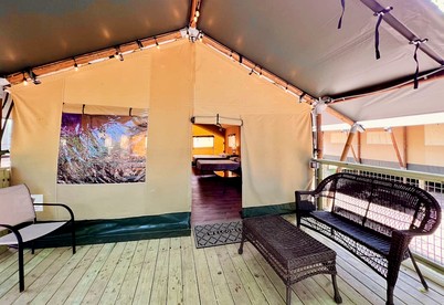 Deluxe Safari Tent Cabin with Creek Swimming, Fishing & Resort-Style Amenities in Marion, Texas - Marion, Texas - glamping.directory