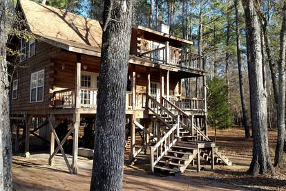 Claxton's Riverfront Family Fun: Cabin Adventures Await - Claxton, Georgia - glamping.directory