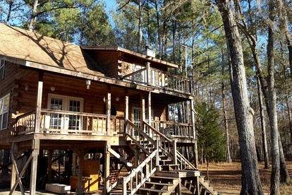 Claxton's Riverfront Family Fun: Cabin Adventures Await - Claxton, Georgia - glamping.directory