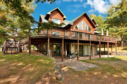 Grand Family-Friendly, Lake Front Cabin with Luxury Amenities for a Relaxing Getaway on Lake Tahkodah in the North Woods of Wisconsin - glamping.directory