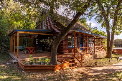 Spacious and Rustic Hill Country Cabin Rental Ideal for Family Getaways near Austin - glamping.directory