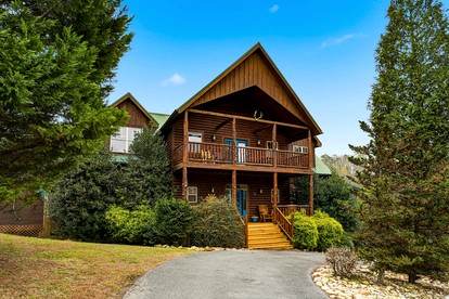 Luxury Log Cabin Escape with Hot Tub, Decks & Family Fun Spaces in Sevierville, Tennessee - glamping.directory