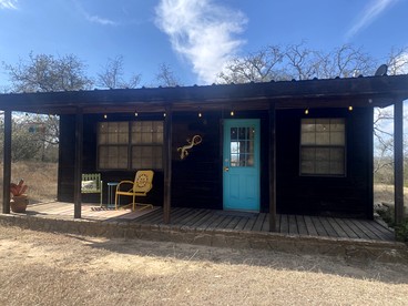 Eco-Friendly Cabin with Private Hot Tub for a Relaxing Getaway near Dallas, Texas - glamping.directory