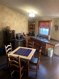 Eco-Friendly Cabin with Private Hot Tub for a Relaxing Getaway near Dallas, Texas - Bluff Dale, Texas - glamping.directory