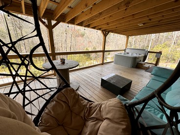 Tranquil Riverfront Retreat with Hot Tub near Waterfalls & Pisgah National Forest, Brevard NC - Balsam Grove, North Carolina - glamping.directory
