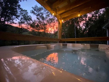 Tranquil Riverfront Retreat with Hot Tub near Waterfalls & Pisgah National Forest, Brevard NC - Balsam Grove, North Carolina - glamping.directory