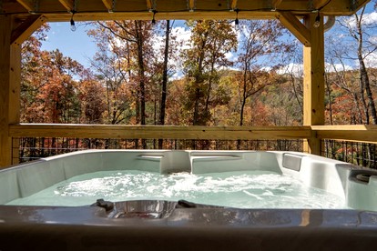 Tranquil Riverfront Retreat with Hot Tub near Waterfalls & Pisgah National Forest, Brevard NC - Balsam Grove, North Carolina - glamping.directory