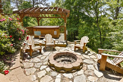 Charming Cabin Rental with a Hot Tub and Fireplace in the Smoky Mountains - Clyde, North Carolina - glamping.directory