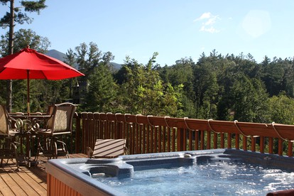 Charming Cabin Rental with a Hot Tub and Fireplace in the Smoky Mountains - Clyde, North Carolina - glamping.directory