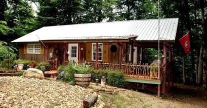 Rustic Wooden Cottage with Hot-Tub and Hiking Trails in Newport, Tennessee - glamping.directory