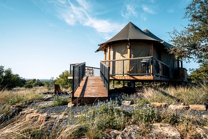 Romantic Tent Rental with a Wood-Burning Stove on the Pedernales River, Texas - glamping.directory