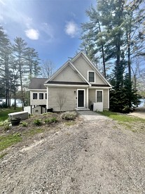 Waterfront Cottage with Equipped Deck and Private Dock in Maine - Naples, Maine - glamping.directory
