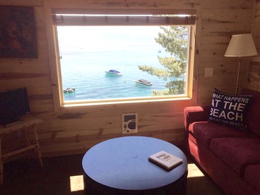 Rustic Waterfront Log Cabin at Meeks Bay on Lake Tahoe, California - Tahamo, California - glamping.directory
