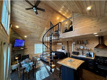 Luxurious Pet Friendly Treehouse with Hot Tub Nestled within the Pine Trees by the Waterfront of Belgrade Stream, Close to Sugarloaf Mountain, Maine - Belgrade, Maine - glamping.directory