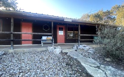 Family Cabin Getaway with an Outdoor Fireplace near Lake Granbury in Texas - glamping.directory