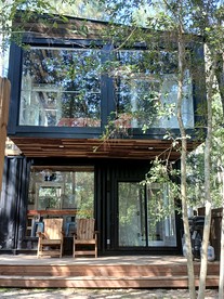 Outstanding Forest Container with Water Views and BBQ in Texas - Grimes County, Texas - glamping.directory