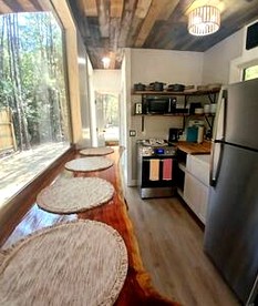 Outstanding Forest Container with Water Views and BBQ in Texas - Grimes County, Texas - glamping.directory