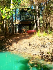 Outstanding Forest Container with Water Views and BBQ in Texas - Grimes County, Texas - glamping.directory