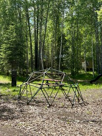 Relaxing Cabin Stay in Nature with Firepits & Kid's Playground in Houston, Alaska - Houston, Alaska - glamping.directory