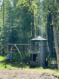 Relaxing Cabin Stay in Nature with Firepits & Kid's Playground in Houston, Alaska - Houston, Alaska - glamping.directory