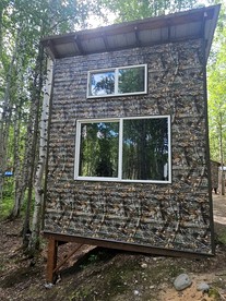 Relaxing Cabin Stay in Nature with Firepits & Kid's Playground in Houston, Alaska - Houston, Alaska - glamping.directory
